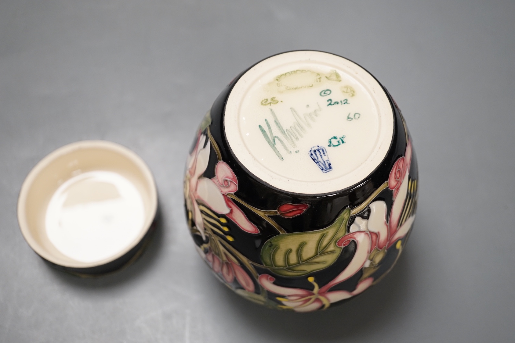 A Moorcroft 'Karzai honeysuckle' jar and cover, by Kerry Goodwin, numbered edition 769/6, 2012, boxed, 15 cms high.